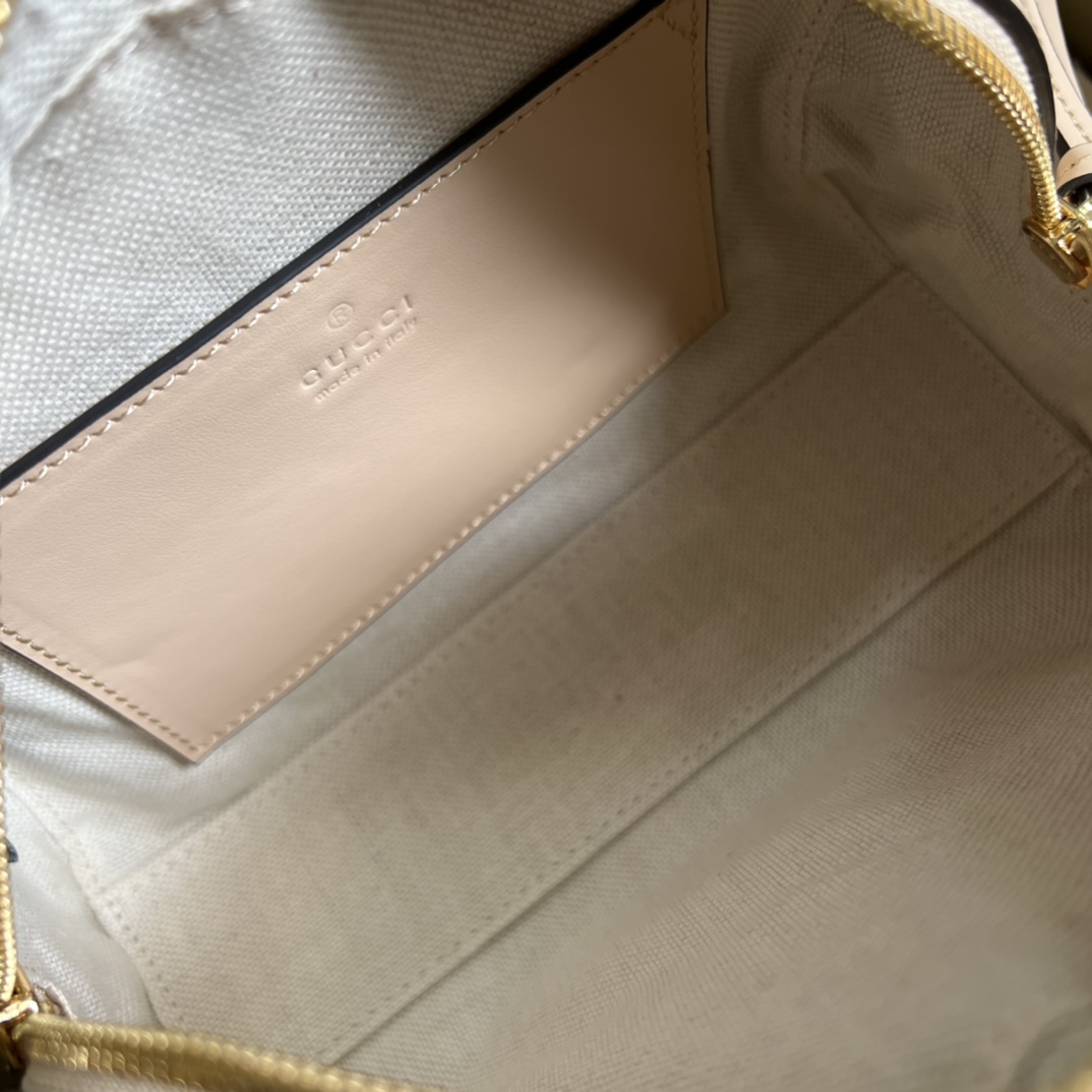 GG Matelassé leather mini bag