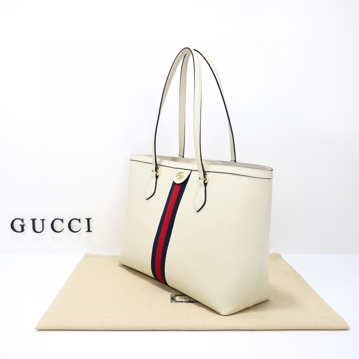 Ophidia medium leather tote in white