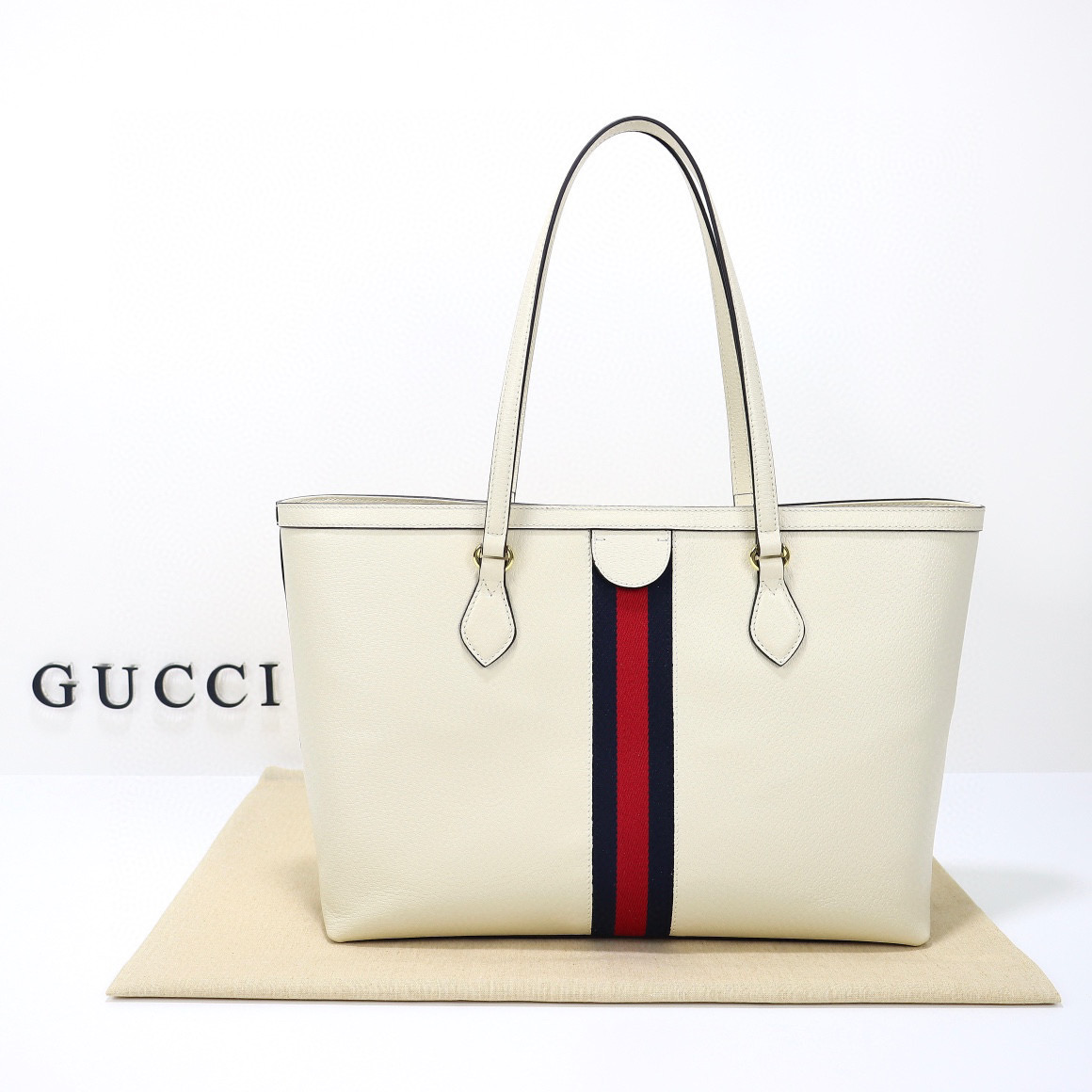 Ophidia medium leather tote in white