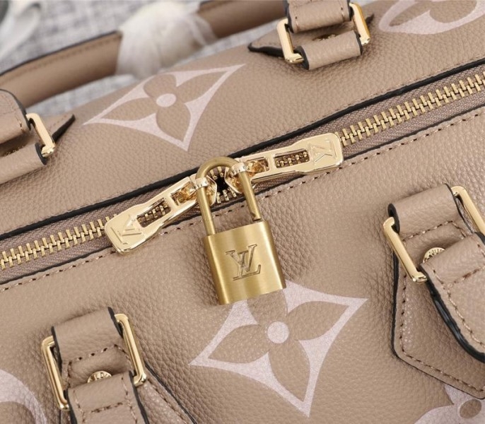 L0vis Vvtt0n Bicolor Monogram Empreinte Leather Speedy Bandouliere 25 Handbag In Tourterelle Gray And Cream