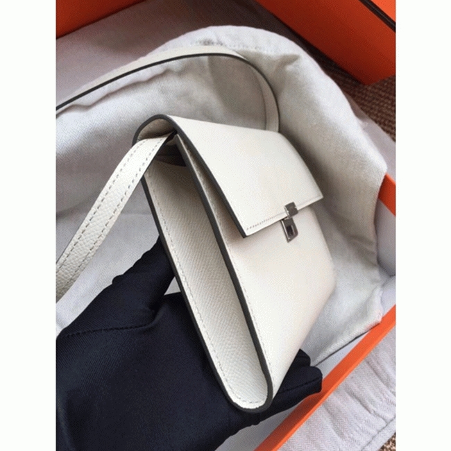 White top knockoff H**me5 Clic wallet with strap