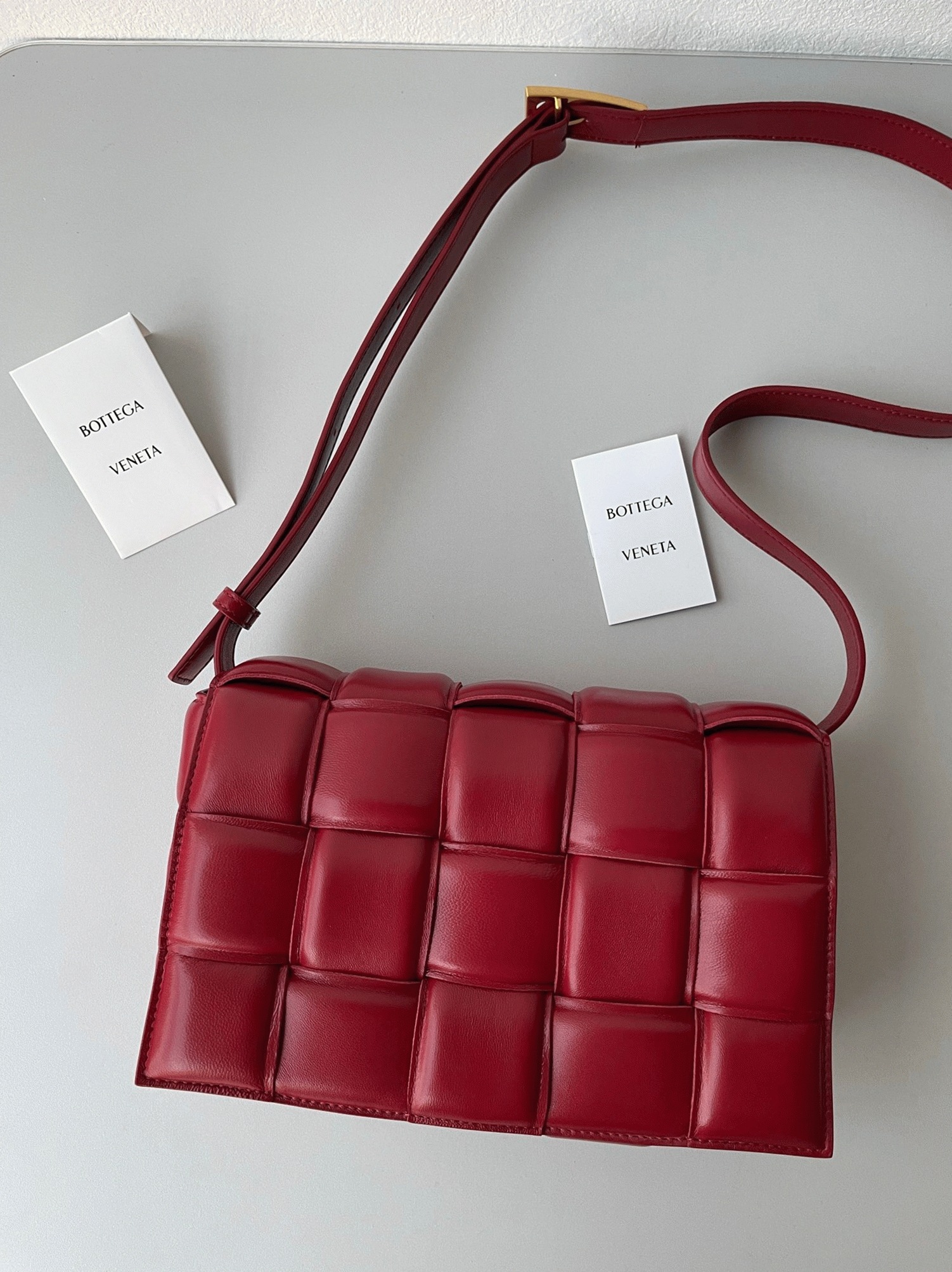 Top Quality Faux B0tt*ga Ven*ta Padded Cassette Bag In Dark Red
