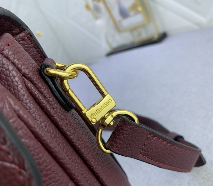 LV Monogram Empreinte Leather Metis In Wine