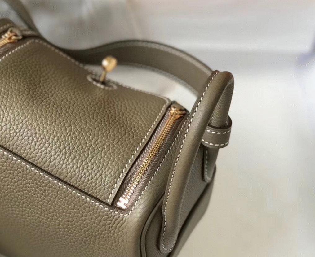 Replica H**me5 Lindy Mini handbag in taupe color