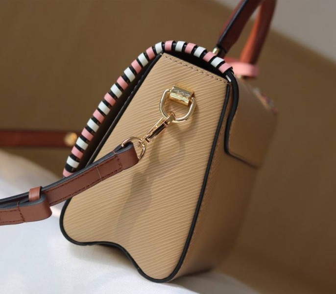 L0vis Vvtt0n Epi Leather Twist MM Bag In Beige With Braided Edges Flap