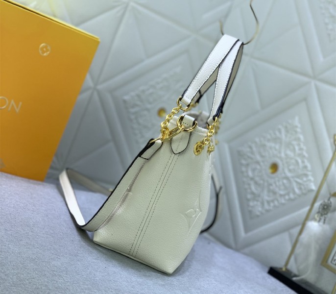 L0vis Vvtt0n Monogram Empreinte Leather Bundle Bag In Cream