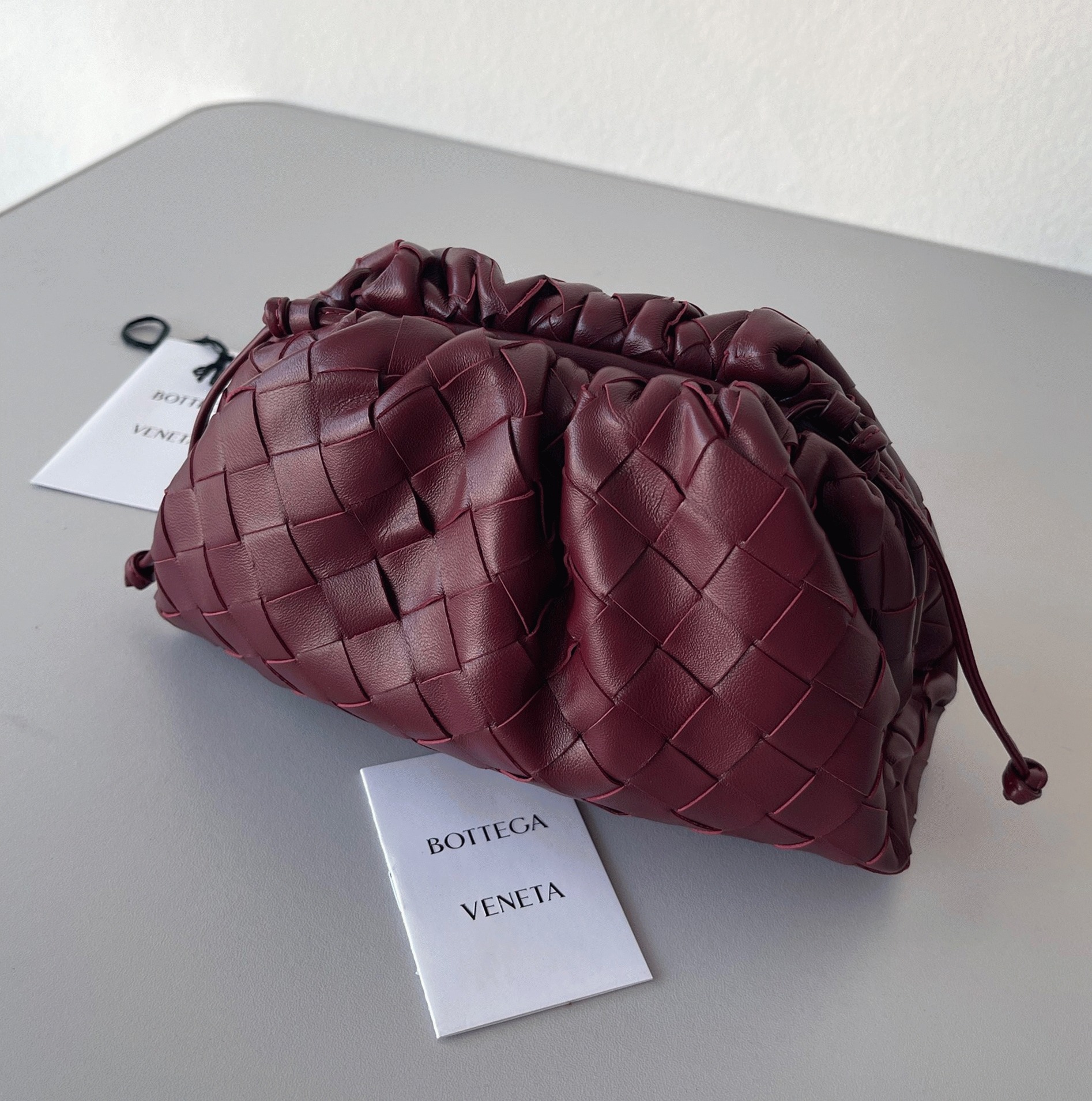 Fake B0tt*ga Ven*ta Mini Pouch with Strap Bordeaux