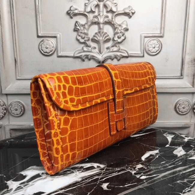 Orange crocodile leather knockoff H**me5 Jige Elan clutch bag
