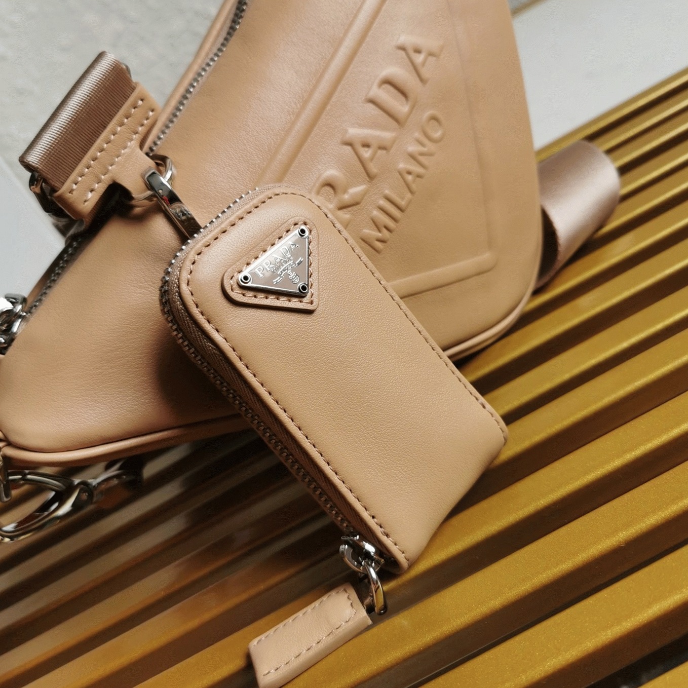 Pra*a Triangle Shoulder Bag Imitation in Beige