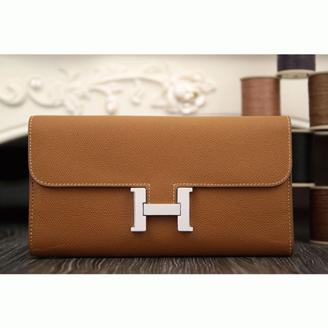 Brown replica H**me5 Constance wallet