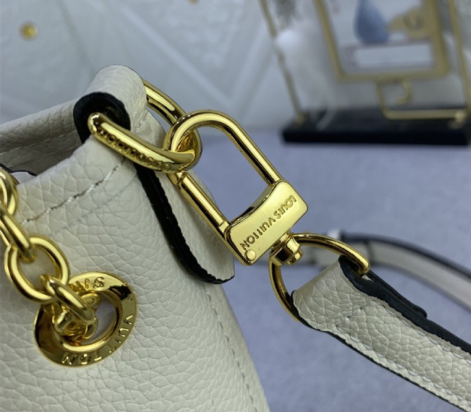 L0vis Vvtt0n Monogram Empreinte Leather Bundle Bag In Cream