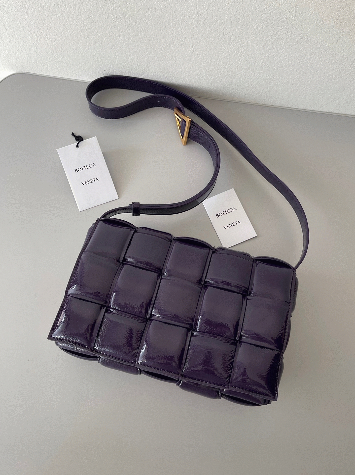 Top Quality Fake B0tt*ga Ven*ta Padded Cassette Bag In Purple
