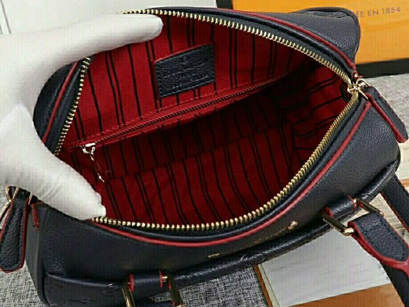L0vis Vvtt0n Monogram Empreinte Speedy Bandouliere 25 Handbag In Navy Blue