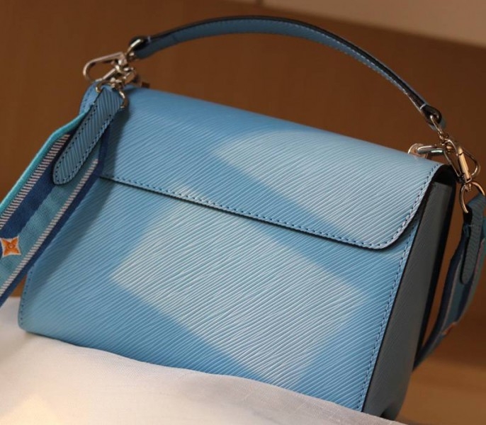 L0vis Vvtt0n Epi Leather Twist MM Bag With Jacquard Strap In Bleuet Blue