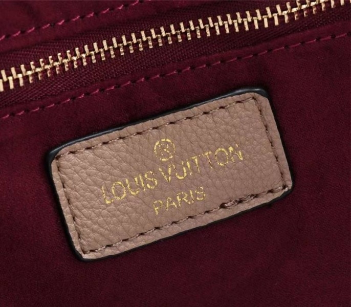 L0vis Vvtt0n Monogram Empreinte Neverfull MM Tote In Beige