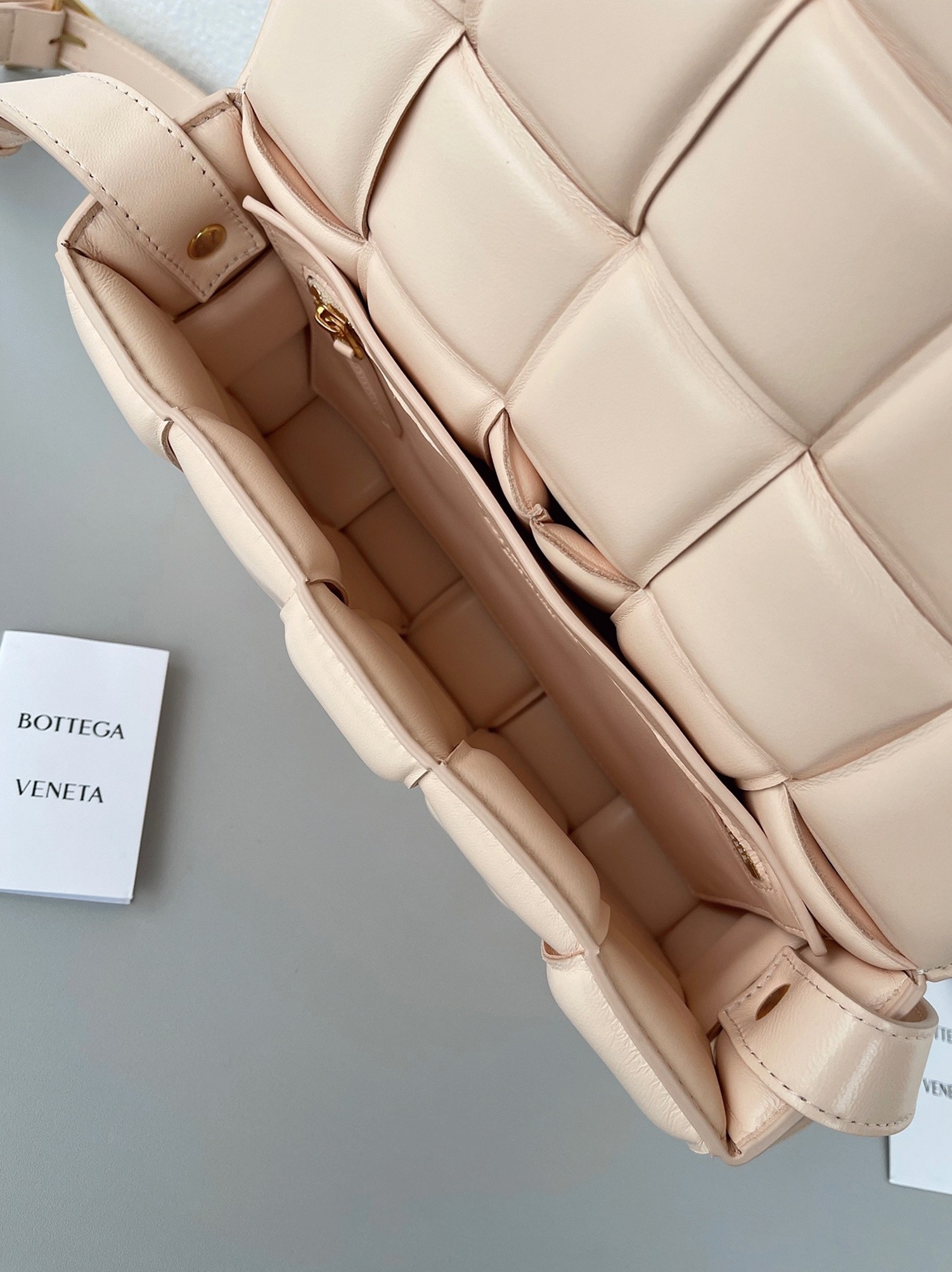 Top Quality Fake B0tt*ga Ven*ta Padded Cassette Bag In Melon