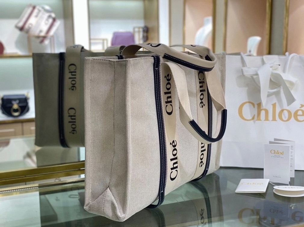 top quality replica Ch10e large woody tote bag in canvas with blue leather strips