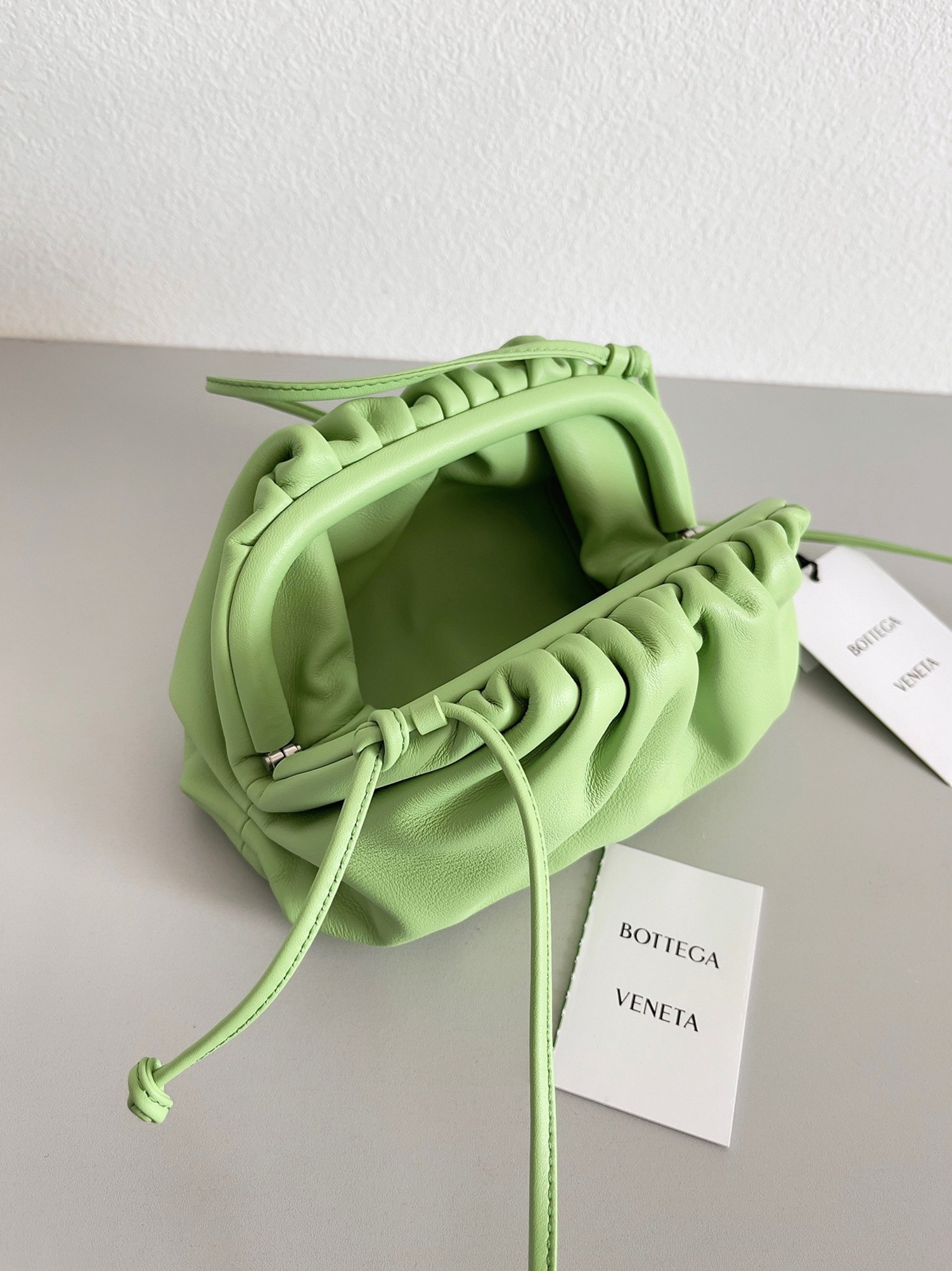 Fake B0tt*ga Ven*ta Mini Pouch with Strap Pistachio