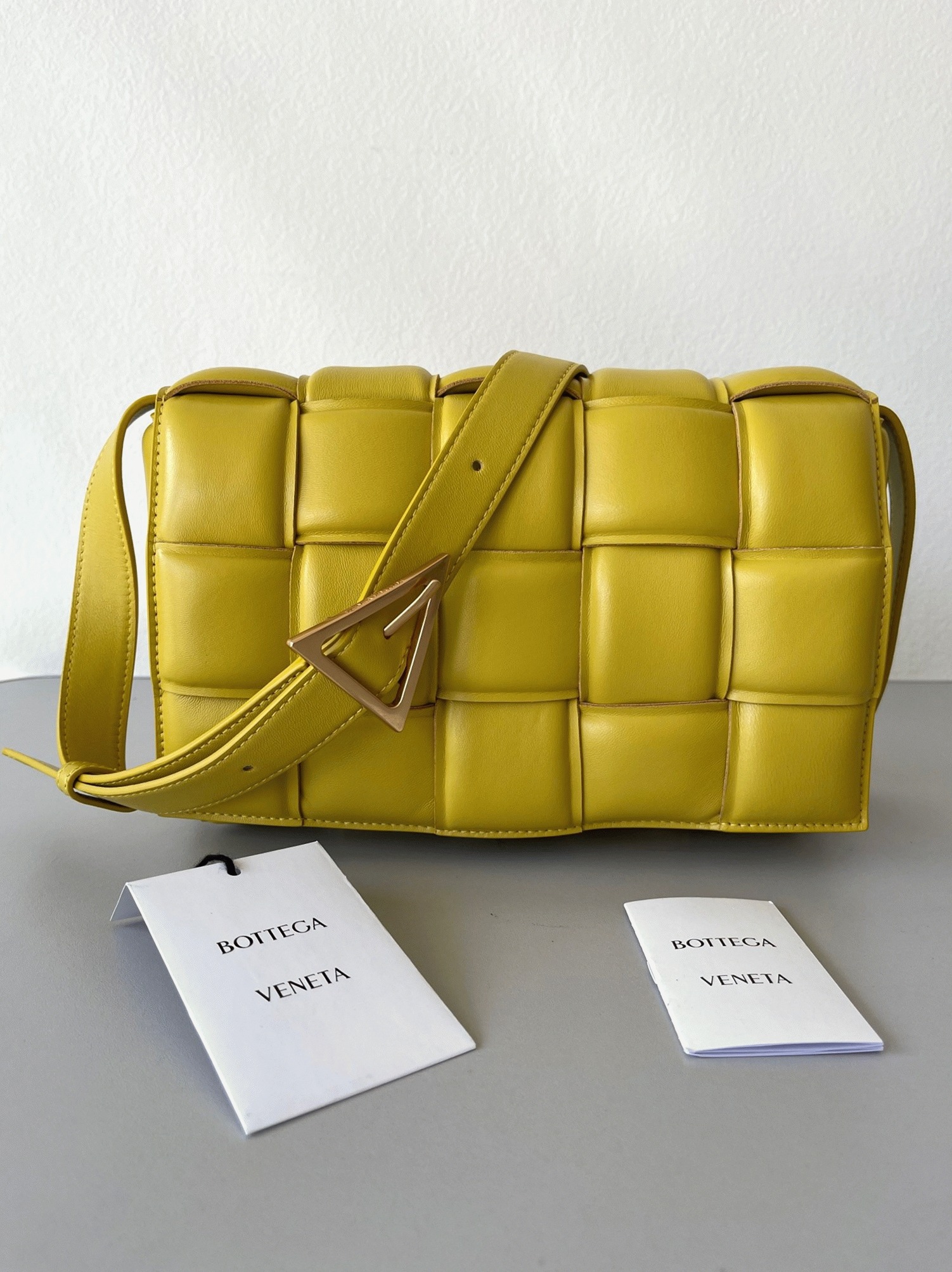 Top Quality Fake B0tt*ga Ven*ta Padded Cassette Bag In Yellow