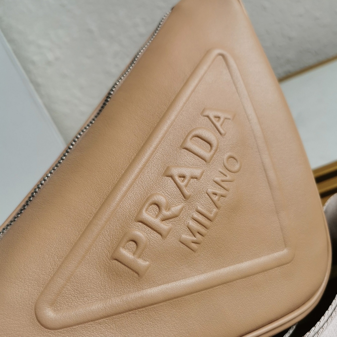 Pra*a Triangle Shoulder Bag Imitation in Beige