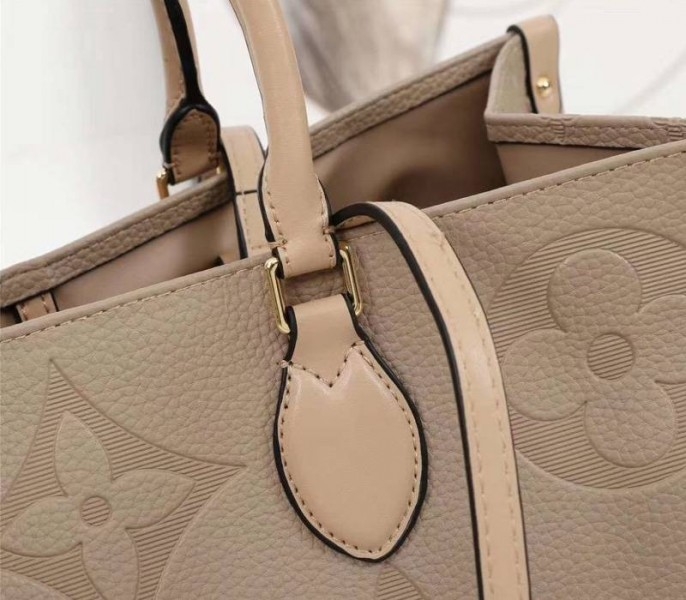 L0vis Vvtt0n Monogram Empreinte Giant Onthego GM Tote In Beige