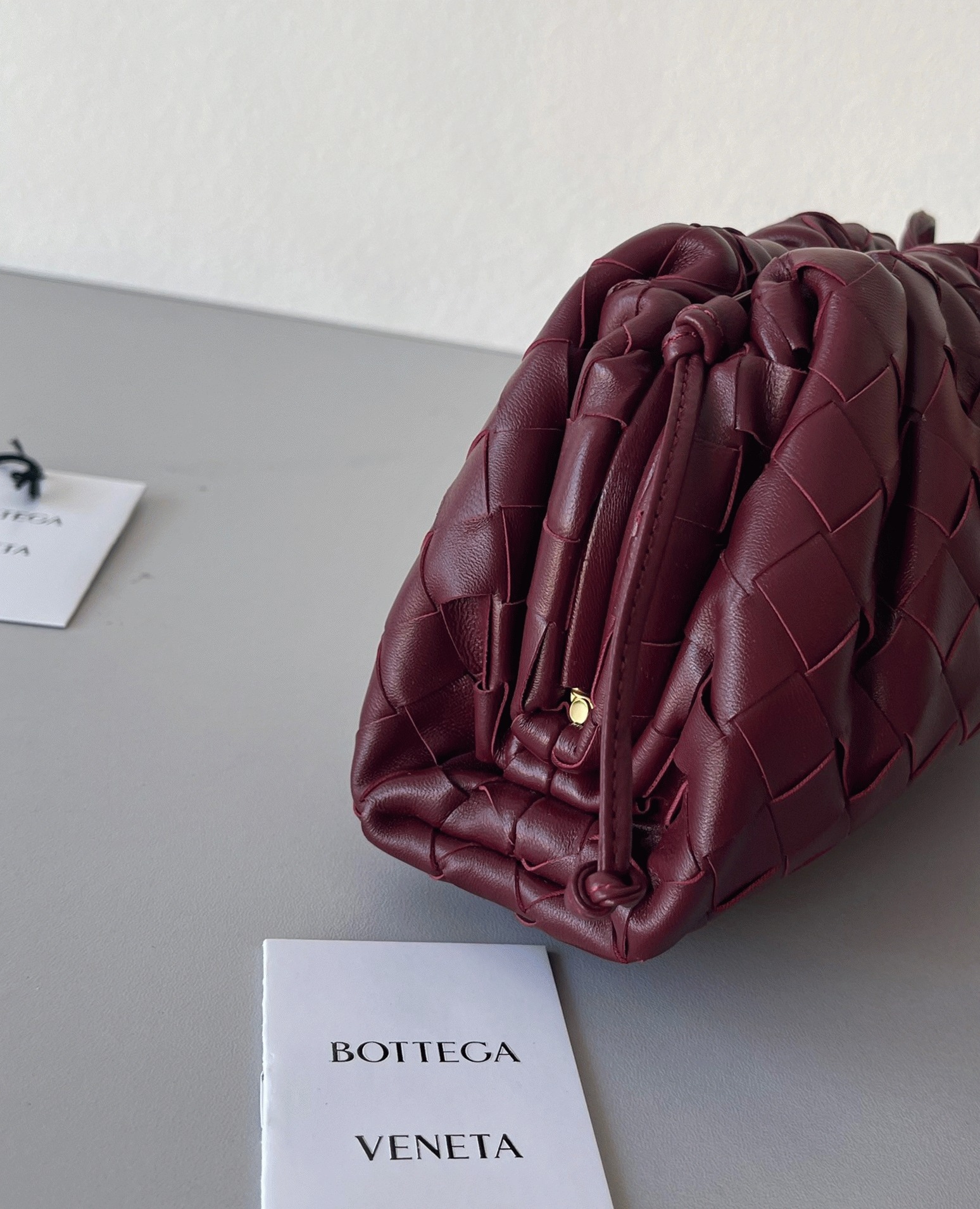Fake B0tt*ga Ven*ta Mini Pouch with Strap Bordeaux