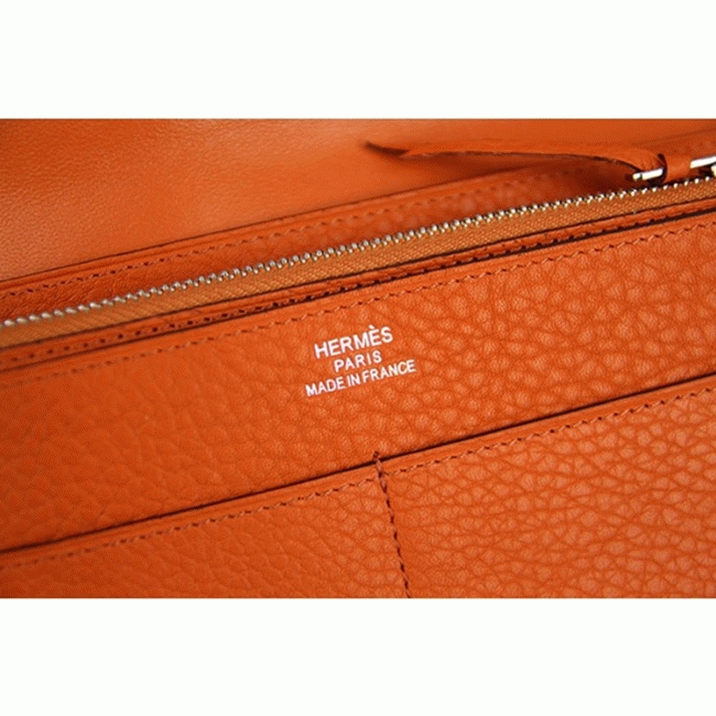 Orange knockoff designer H**me5 Dogon combine wallet