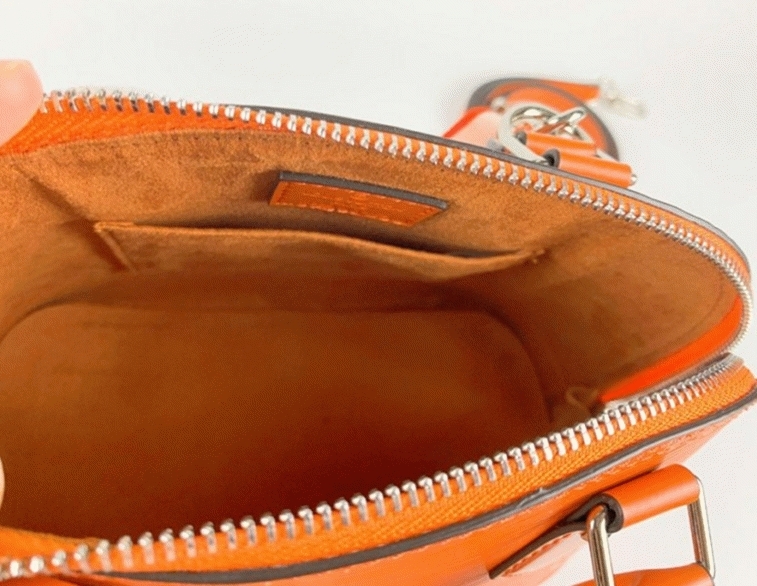 L0vis Vvtt0n Epi Leather Alma BB Handbag In Orange With Jacquard Strap