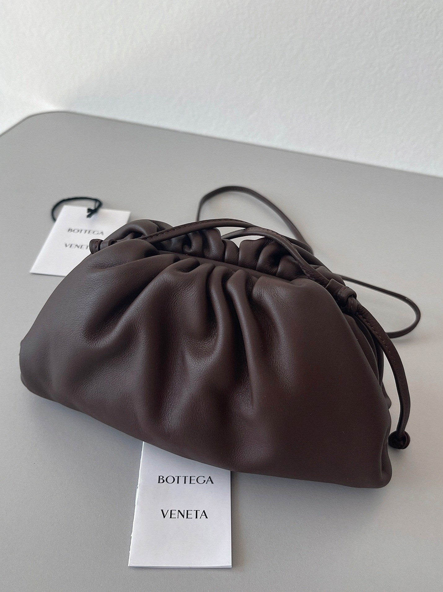 Knockoff B0tt*ga Ven*ta Mini Pouch with Strap Fondant