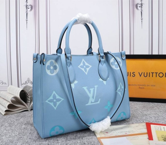 L0vis Vvtt0n Monogram Empreinte Leather Onthego MM Bag In Summer Blue
