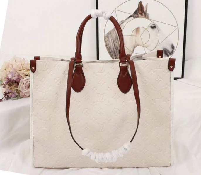 L0vis Vvtt0n Monogram Empreinte Onthego GM Tote In Cream