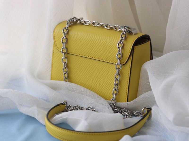 L0vis Vvtt0n Epi Leather Twist Mini Bag In Yellow