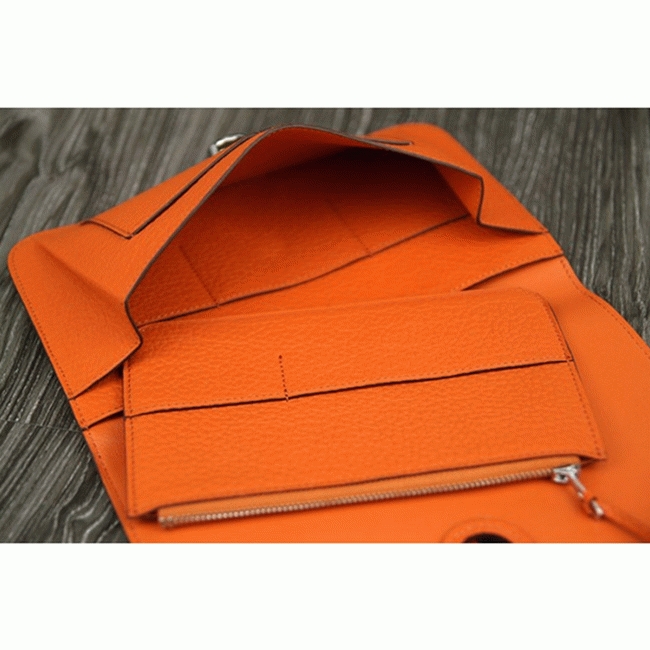 Orange knockoff designer H**me5 Dogon combine wallet