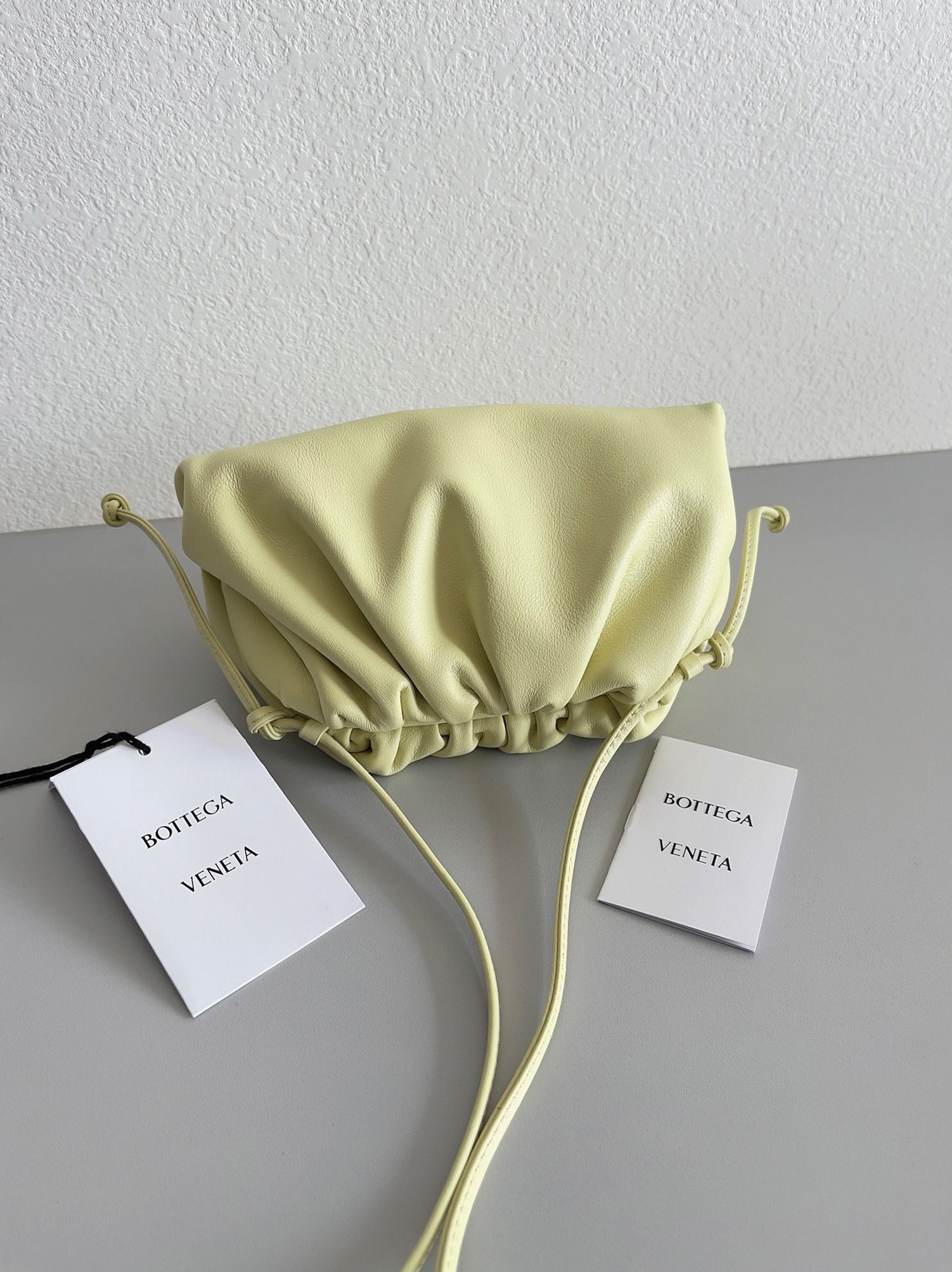 Fake B0tt*ga Ven*ta Mini Pouch with Strap Zest Washed