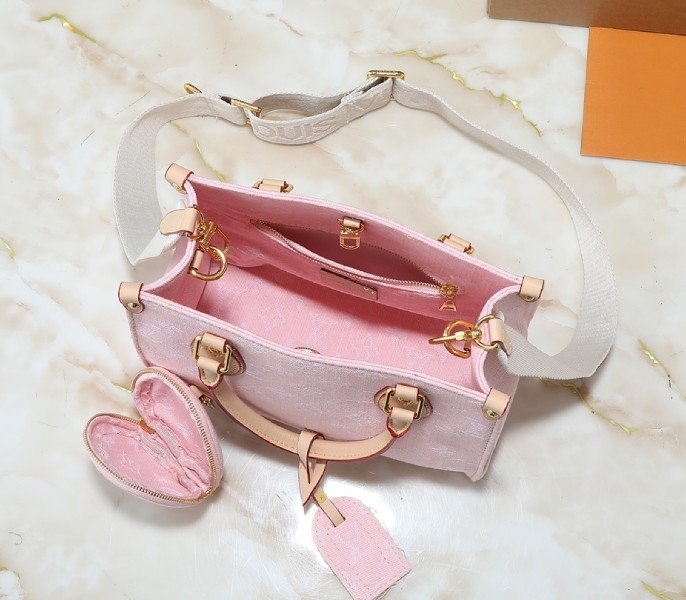 monogram De*1m onthego pm in washed pink