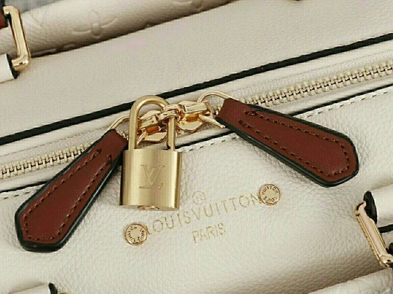 L0vis Vvtt0n Monogram Empreinte Speedy Bandouliere 25 Handbag In Cream