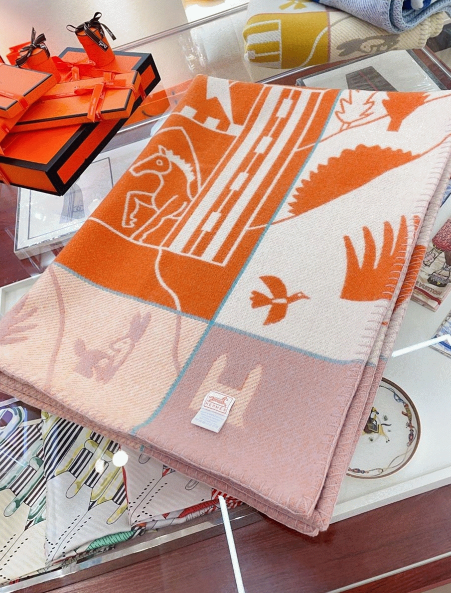 Faux H**me5 Avalon Epopee blanket in mandarine wool and cashmere