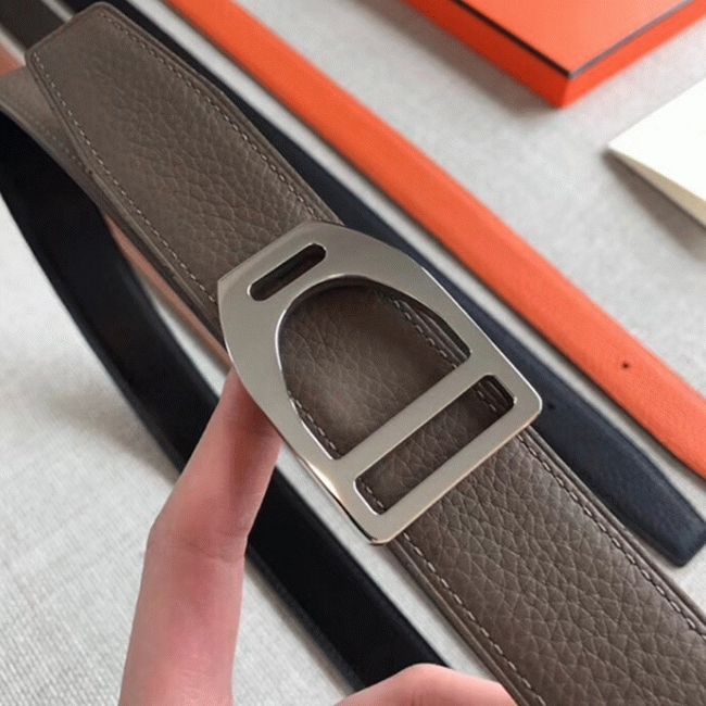 Knockoff H**me5 Etrier buckle belt in taupe shade