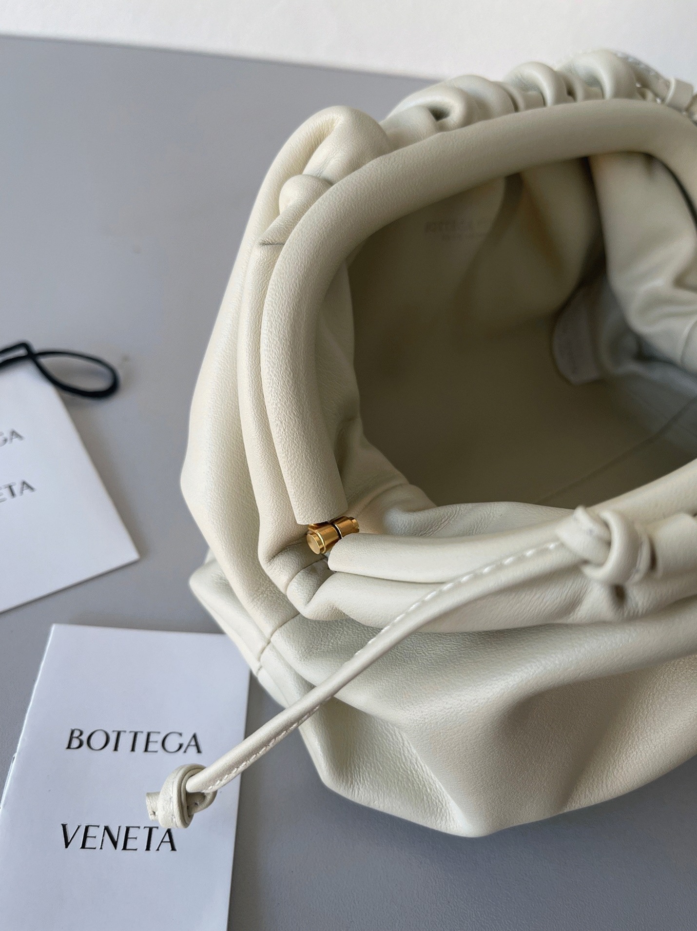 Knockoff B0tt*ga Ven*ta Mini Pouch with Strap Ivory