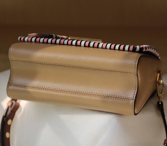 L0vis Vvtt0n Epi Leather Twist MM Bag In Beige With Braided Edges Flap