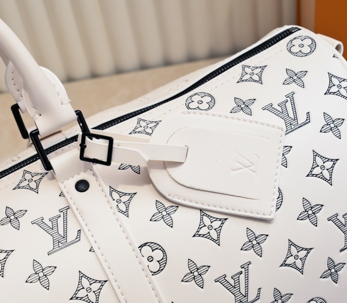 LV Monogram Shadow Keepall Bandouliere 50 In White