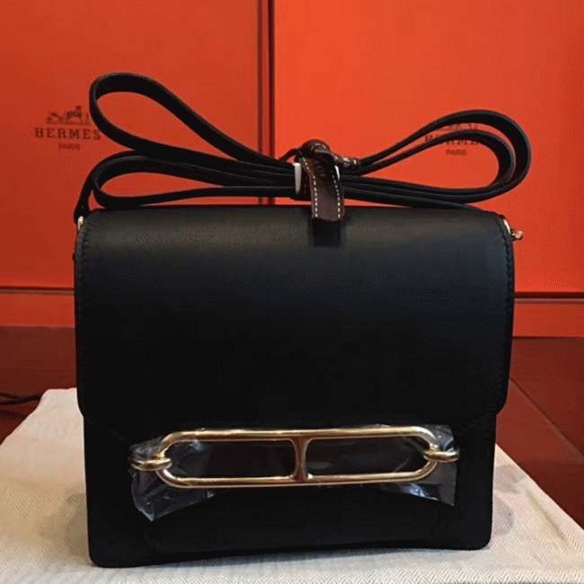 Black knockoff H**me5 Mini Sac Roulis handbag