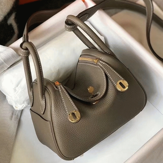 Replica H**me5 Lindy Mini handbag in taupe color