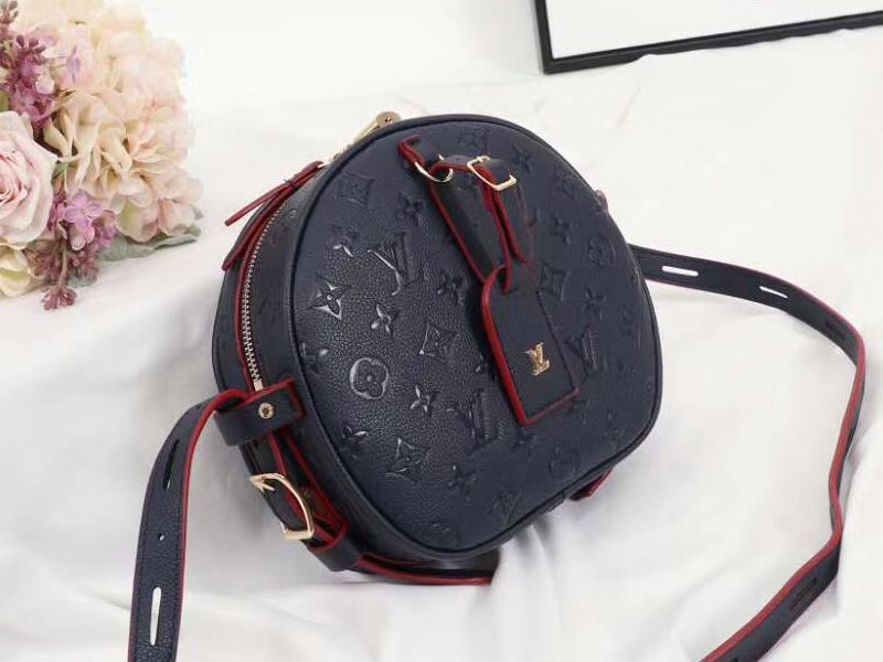 L0vis Vvtt0n Monogram Empreinte Boite Chapeau Souple MM Bag In Navy Blue